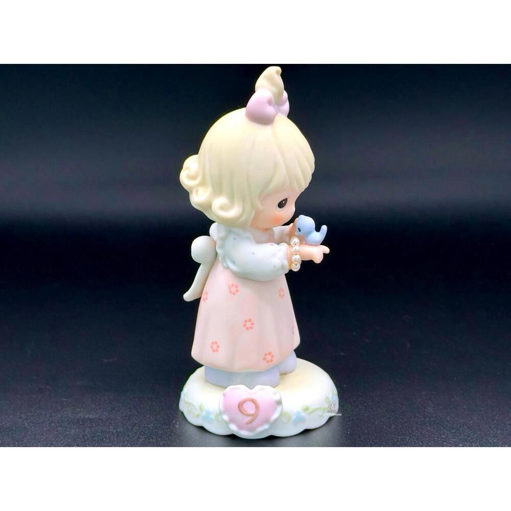 Precious Moments Girl with Bird and Pearl Bracelet